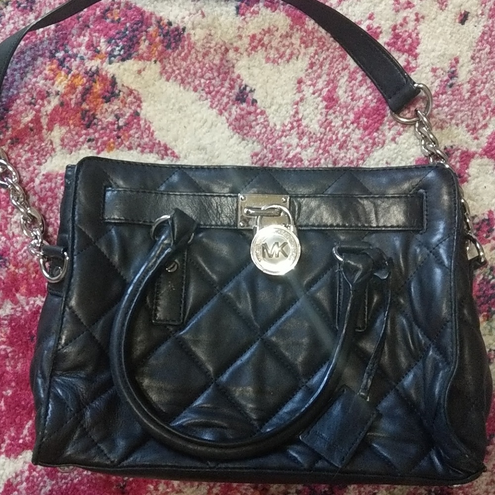 Black quilted Michale Kors handbag w/ silver